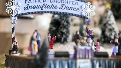 A revolving display from the local community area in the Christmas village.