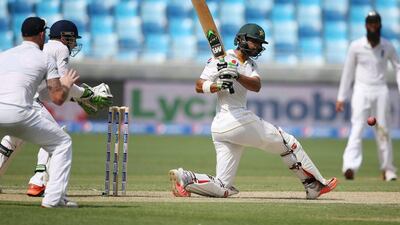 Shan Masood plays a shot during the Pakistan and England Test match at the Dubai International Stadium. Kamran Jebreili / AP Photo
