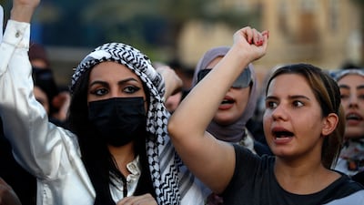 Iraqi women demonstrate against underage marriage in Tahrir Square in central Baghdad. Rights advocates say a bill introduced to Iraq's parliament would roll back women's rights and increase underage marriage in the deeply patriarchal society. AFP