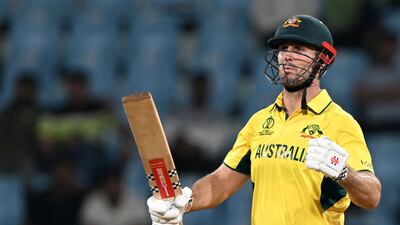 Australia's Mitchell Marsh celebrates after scoring a half-century. AFP