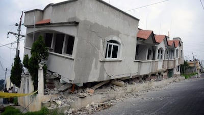 View of houses damaged by an earthquake, in San Marcos, 240km of Guatemala City. A strong 6.9-magnitude earthquake rocked parts of southern Mexico and Guatemala. Johan Ordonez / AFP