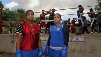 Two Muslim women, Sanno Singh, left, and twin Shakila, have had to convince everyone from their father to those arguing that boxing is a man's world to compete.