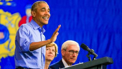 US Senator Tammy Baldwin from Wisconsin (centre) and Democratic gubernatorial candidate Tony Evers (right) listen as former US President Barack Obama (left) speaks at a campaign event for Democratic candidates at North Division High School in Milwaukee, Wisconsin, USA. Mid-Term elections will be held on November 6 and local, state and national candidates are running for election and re-election. EPA