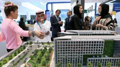 Visitors get briefed on the Park View project by Bloom Properties. Ravindranath K / The National