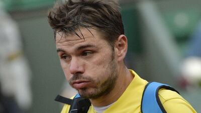 Stan Wawrinka lost his first-round match at the French Open. Miguel Medina / AFP