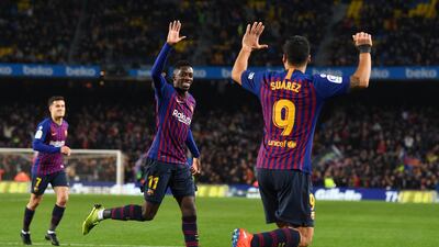 Ousmane Dembele celebrates after scoring Barcelona's fortst goal against Leganes at Camp Nou. Getty Images