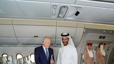 Sir Tim shows Mr bin Touq round the new aircraft. Emirates