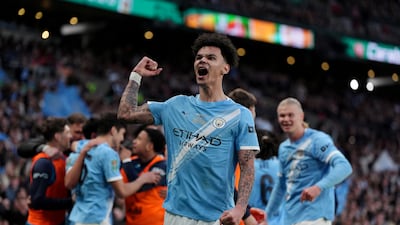 Manchester City's Nico O'Reilly celebrates after scoring his sides first goal during the League Cup final against Arsenal at the Wembley Stadium in London. PA