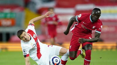 Southampton's Jan Bednarek and Sadio Mane battle for the ball. PA