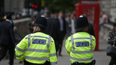 British Metropolitan Police officers standing on duty in central London. Daniel Leal-Olivas / AFP