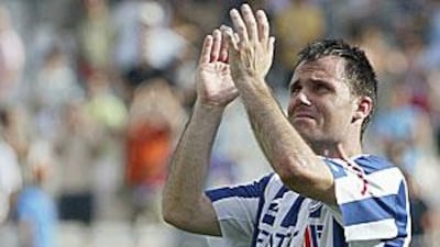 Real Sociedad's Gerardo Garcia applauds his fans after the club were relegated from the Primera Liga the end of the 2006/07 season.