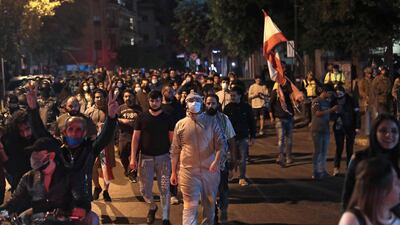 Lebanese demonstrators chant anti-government slogans while they walk through the streets of the capital Beirut. AFP