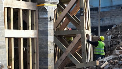 Iraqi workers prepare scaffolds during the reconstruction of the Great Mosque of Al-Nuri in Mosul’s war-ravaged old town. AFP