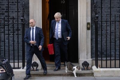 Prime Minister Boris Johnson leaves 10 Downing Street to make a statement at Parliament following publication of the Gray Report into lockdown parties. Getty.