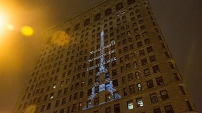 A projection of the Eiffel Tower is displayed on the side of New York City's Flatiron building on November 18, 2015 in New York City. Andrew Burton / Getty Images/AFP