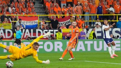 England's Ollie Watkins, right, scores his side's decisive second goal against Netherlands. AP