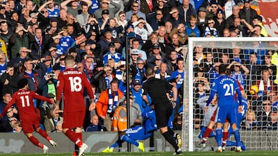 Liverpool's Mohamed Salah scores the opening goal against Cardiff City. A second-half Sadio Mane double and a strike from substitute Xherdan Shaqiri sent Liverpool on their way to a 4-1 win at Anfield. AFP
