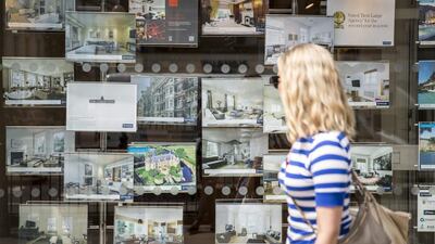 An estate agent's window display on Brompton Road in Knightsbridge. The prime central London location lead a property price plunge in the city's most expensive areas in the 12 months to July, Knight Frank reports. Rob Stothard / Getty Images