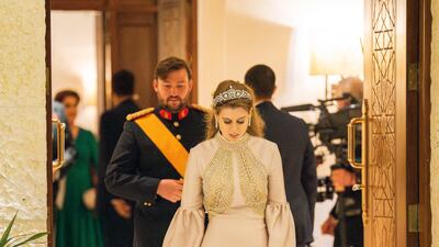 Princess Beatrice wore a champagne satin gown by Lebanese designer Reem Acra for the evening reception. PA