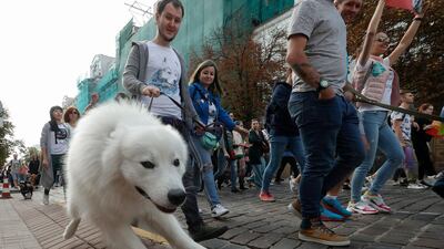 Ukrainian activists with their pets take part in a rally advocating for animal rights, in downtown Kiev, Ukraine. EPA