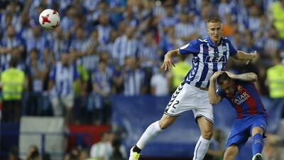 Barcelona’s Paco Alcacer, right, fights for the ball with Alaves’ Rodrigo Ely during the Copa del Rey final at the Vicente Calderon stadium in Madrid, Spain, Saturday May 27, 2017. Daniel Ochoa de Olza / AP Photo