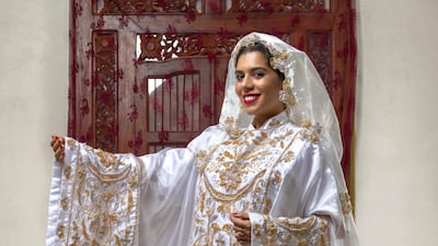 HIJAZ BRIDE: Two types of scarves, call the miharam and maudwra, are worn on the head. These two layers of scarfs are worn with most outfits in Hijaz, but with differing levels of decoration.