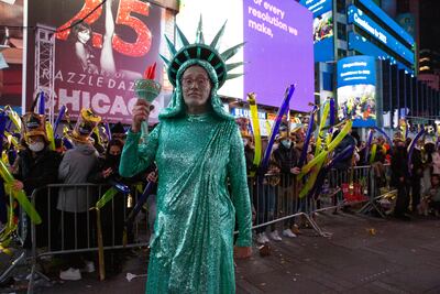 CNN broadcaster Richard Quest dressed up as the Statue of Liberty to celebrate the New Year. Photo: EPA