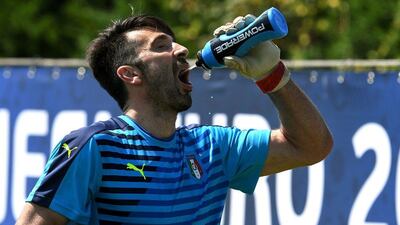 Italy goalkeeper Gianluigi Buffon drinks at the end of a training session at the team’s training ground in Montpellier on July 1, 2016, on the eve of the Euro 2016 quarter-final football match between Germany and Italy. Vincenzo Pinto / AFP