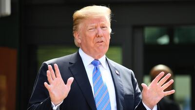 President Donald Trump speaks to media as he departs the G7 summit in Canada. Following the fractious meeting, this week's focus will be on the summit between Mr Trump and Kim Jong-un. Neil Hall / Pool