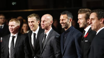 Salford City owners, from left to right, Paul Scholes, Phil Neville, Nicky Butt, Ryan Giggs and, far right, Gary Neville, with David Beckham at a documentary premier in December 2013. Tal Cohen / EPA
