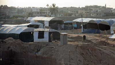A Hamas policeman stands guard in an area of the tunnels that used to buzz with the sound of activity in the southern Gazan town of Rafah on February 18. Egypt destroyed the roughly 1,200 tunnels that circumvented an Israeli blockade to bring Gazans everything from concrete to weapons. Heidi Levine for The National.