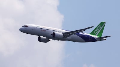 A Comac C919 narrow-body jet takes part in an aerial display before the start of the Singapore Airshow in February. Reuters