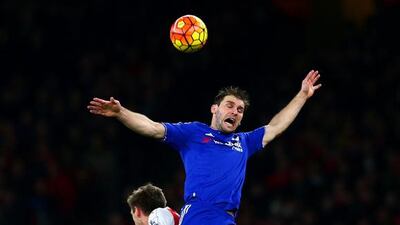 Branislav Ivanovic of Chelsea and Nacho Monreal of Arsenal compete in the air for the ball on Sunday. Clive Mason / Getty Images