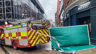 Scaffolding was dislodged in Belfast City centre amid high winds. PA