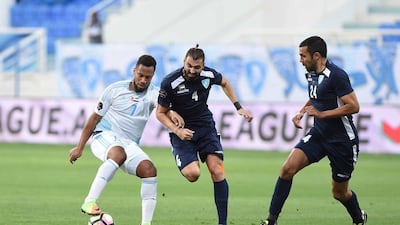 Baniyas, white and blue, are rooted to the bottom of the Arabian Gulf League table even after the victory over Hatta on Saturday evening. Courtesy Arabian Gulf League
