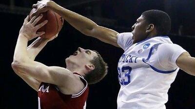 Indiana and Cody Zeller, left, could not get past Kentucky and Anthony Davis, right. The Wildcats face state rival Louisville in the Final Four at New Orleans on Saturday.