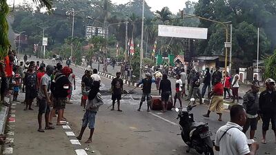 Protesters take to the street to face off with Indonesian police. AFP