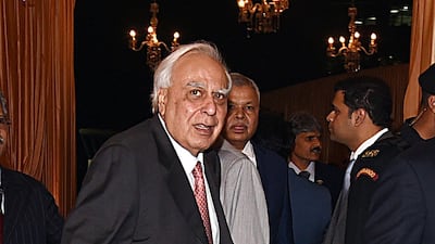 Indian politician Kapil Sibal attends the wedding reception of Isha Ambani. Photo: AFP