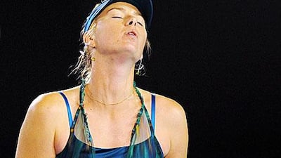 The 2008 Australian Open champion reacts after her first round loss to Maria Kirilenko at the Rod Laver arena in Melbourne.