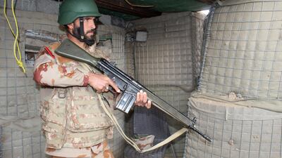 A Pakistani soldier stands guard in a bunker at the Pakistan-Afghanistan border in Chaman. AFP