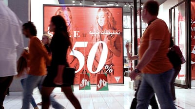 Shoppers at The Dubai Mall during the Dubai Shopping Festival. The mall is benefiting from increased tourist traffic in the emirate. Jeffrey E Biteng / The National