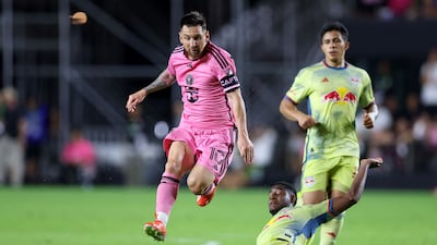 Lionel Messi skips over a challenge from New York defender Andres Reyes. AFP