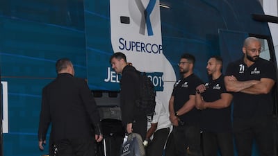 Alessio Romagnoli of AC Milan collects his bag from the team bus in Jeddah. Getty Images