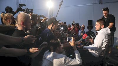 Khabib Nurmagomedovspeaks to reporters.