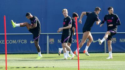 Barcelona's Memphis Depay, Luuk de Jong and Clement Lenglet. Reuters