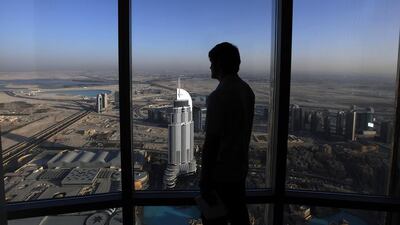 Apartment prices in the Burj Khalifa have dropped by 6.9 per cent in the last three months alone in Dubai. Satish Kumar / The National