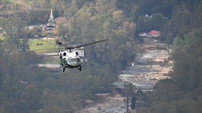 Marine One, carrying US President Joe Biden, flies above a storm-affected area near Greenville, South Carolina. AFP