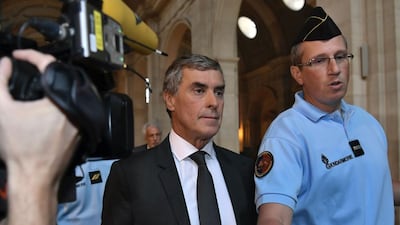 The French former budget minister Jerome Cahuzac (C) arrives at the Paris courthouse for his tax fraud trial today. Philippe Lopez / AFP