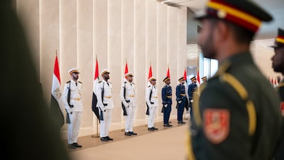 The guard of honour standing to attention