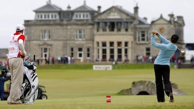 This is a Sunday, Aug. 5, 2007 file photo of tournament winner and world number one Mexico's Lorena Ochoa as she tees off from the 18th with the St Andrews clubhouse in the background, during the Women's British Open golf tournament on the Old Course at the Royal and Ancient Golf Club in St Andrews, Scotland. The Royal & Ancient could finally be allowing women to join one of the most influential golf clubs. Matt Dunham / AP Photo